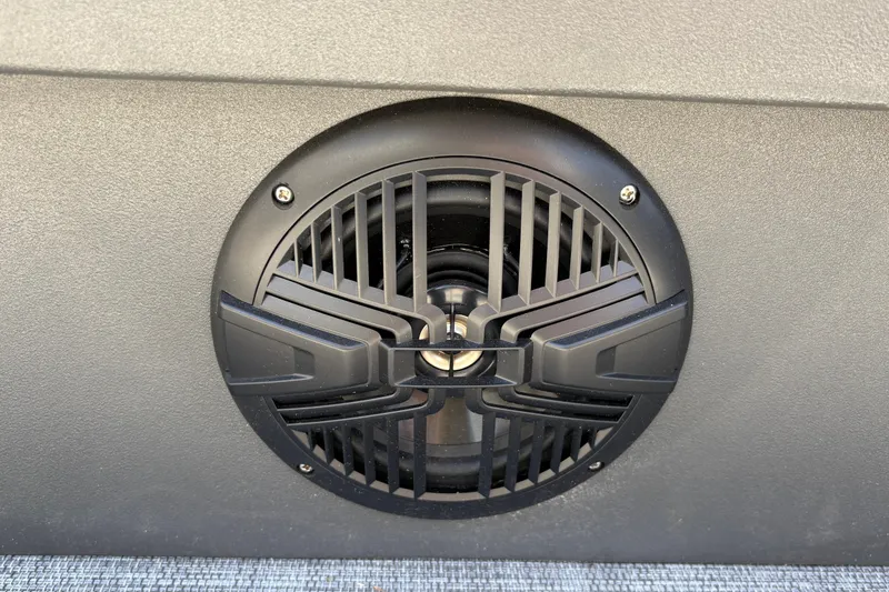 Slide: The Image of Close-up of a speaker on a 2026 Sun Tracker SportFish 22 DLX boat. - 21