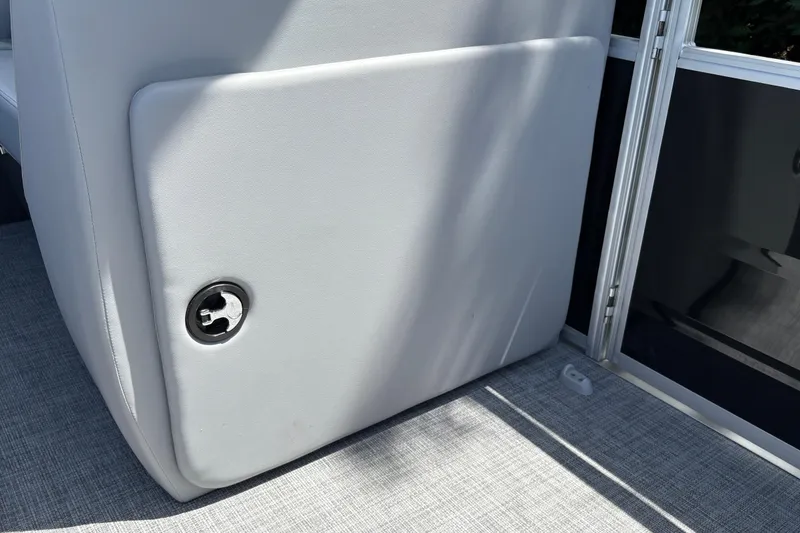 Slide: The Image of 2026 Sun Tracker SportFish 22 DLX boat interior with sleek upholstery and modern design. - 25
