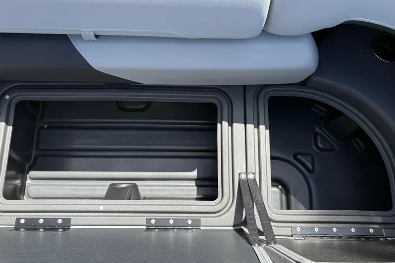 Slide: The Image of Storage compartments on a 2026 Sun Tracker SportFish 22 DLX boat. - 23