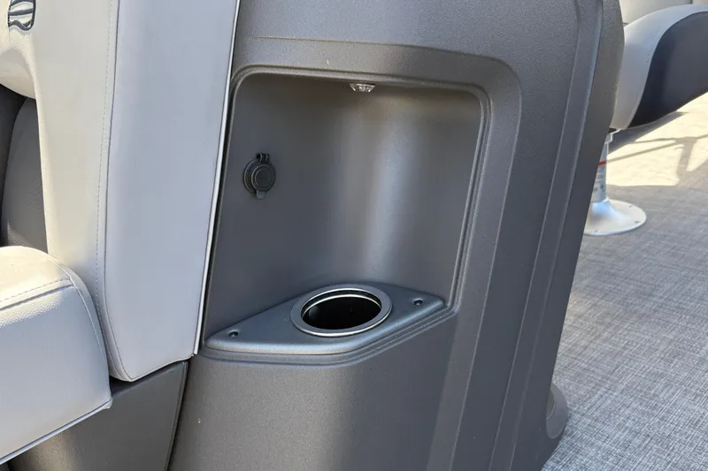 Slide: The Image of Cup holder and storage compartment on 2026 Sun Tracker SportFish 22 DLX boat. - 20
