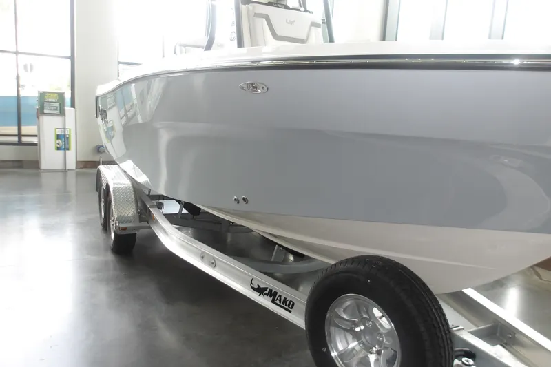 Slide: The Image of 2026 Mako 226 Center Console boat on trailer in showroom. - 38