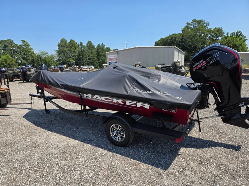 Slide: The Image of 2025 Tracker Pro Team 190 boat with cover on trailer. - 6