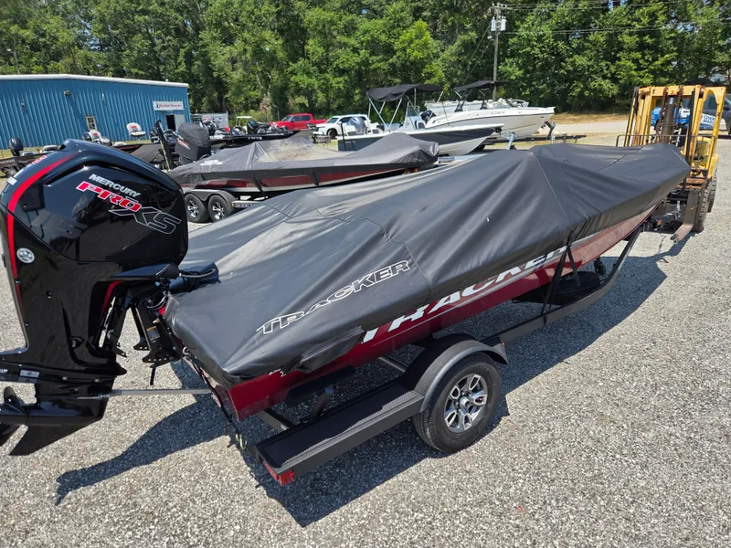 Slide: The Image of 2025 Tracker Pro Team 190 boat with cover on trailer. - 7