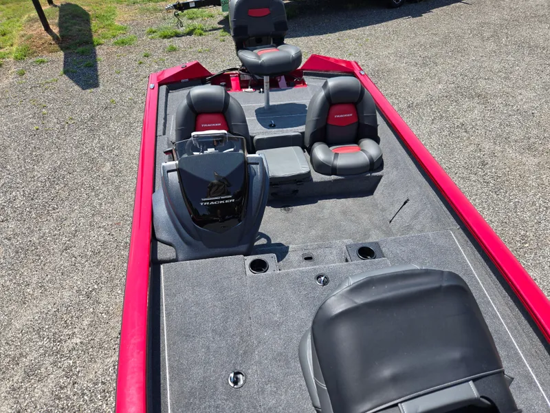 Slide: The Image of 2025 Tracker Pro Team 190 boat with gray interior and red accents. - 9