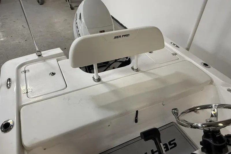 Slide: The Image of 2026 Sea Pro 172 Bay boat interior with steering wheel and seating. - 6