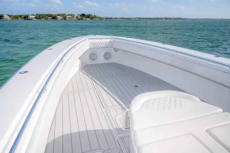 Slide: The Image of 2020 Contender 44 ST boat deck with ocean view and clear skies. - 17