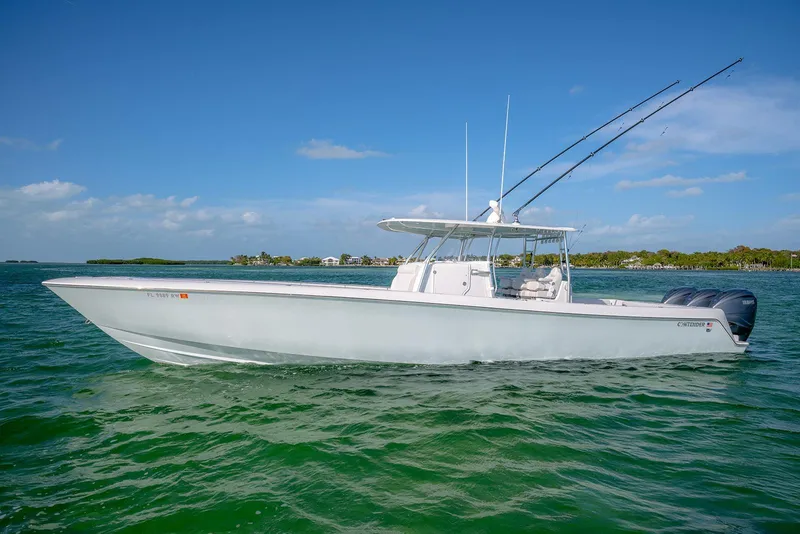Slide: The Image of 2020 Contender 44 ST boat on clear water under blue sky. - 5