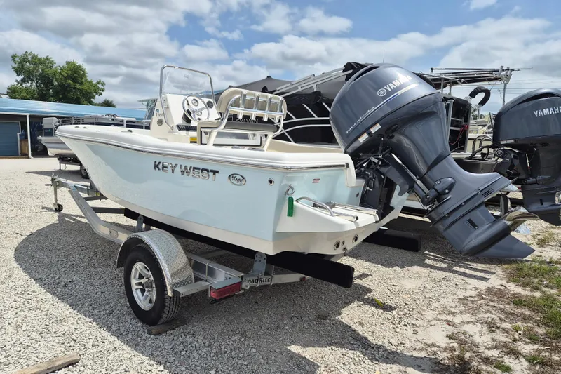 The Image of 2026 Key West 179 FS boat on trailer with Yamaha outboard motor. - 1