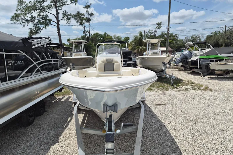 Slide: The Image of 2026 Key West 179 FS boat on trailer in outdoor lot. - 3