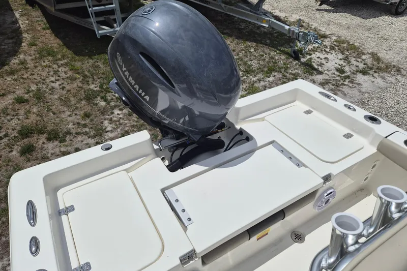 Slide: The Image of 2026 Key West 179 FS boat with Yamaha outboard motor, rear deck view. - 4