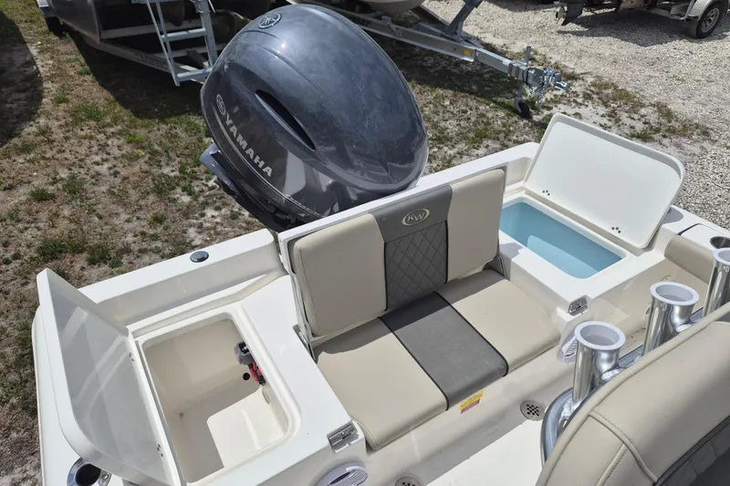 Slide: The Image of 2026 Key West 179 FS boat with Yamaha engine, featuring seating and storage compartments. - 5