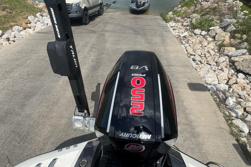 Slide: The Image of Boat with Mercury Pro XS engine on a ramp, featuring Talon anchor system. - 4