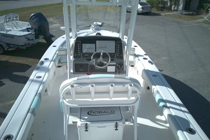 Slide: The Image of 2024 Robalo 246 Cayman boat interior with Garmin navigation system. - 7