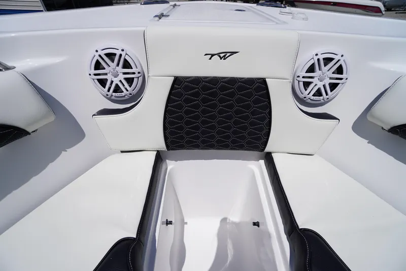 Slide: The Image of 2026 Tidewater 232 LXF boat interior with speakers and stylish seating. - 15