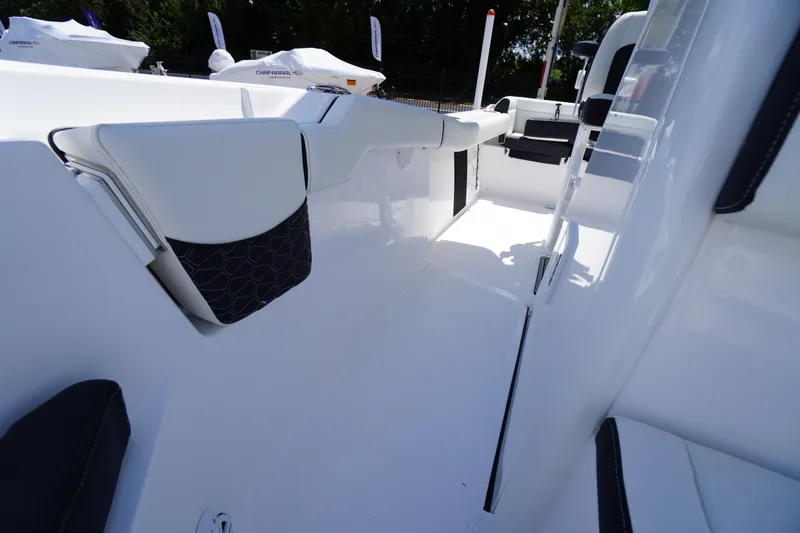 Slide: The Image of 2026 Tidewater 232 LXF boat interior, featuring sleek white seating and modern design elements. - 19