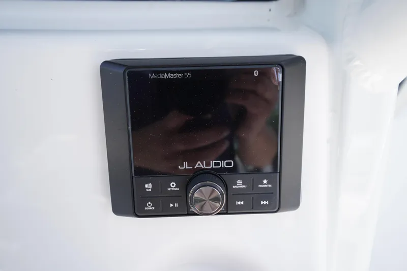 Slide: The Image of JL Audio MediaMaster 55 control panel on 2026 Tidewater 232 LXF boat. - 28