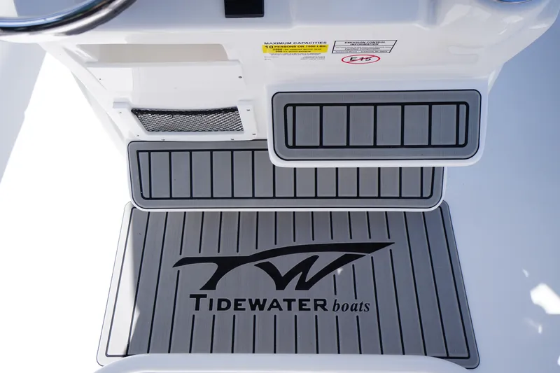 Slide: The Image of Tidewater 232 LXF 2026 boat deck with logo and non-slip surface. - 34
