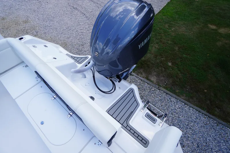 Slide: The Image of 2026 Tidewater 232 LXF boat with Yamaha engine, rear deck view. - 54
