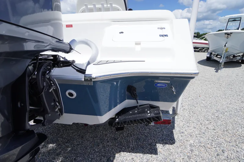 Slide: The Image of 2026 Tidewater 232 LXF boat rear view, featuring sleek design and modern outboard motor. - 68