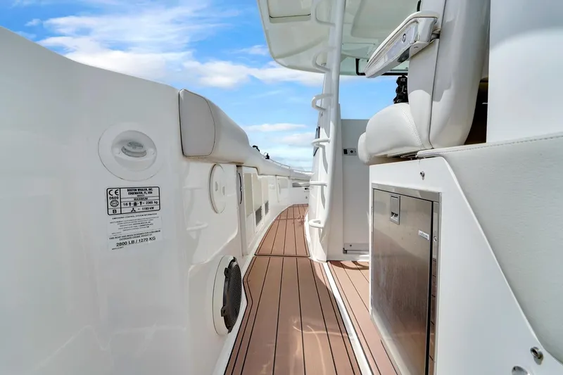 Slide: The Image of 2020 Boston Whaler 380 Outrage boat interior with sleek design and modern amenities. - 26