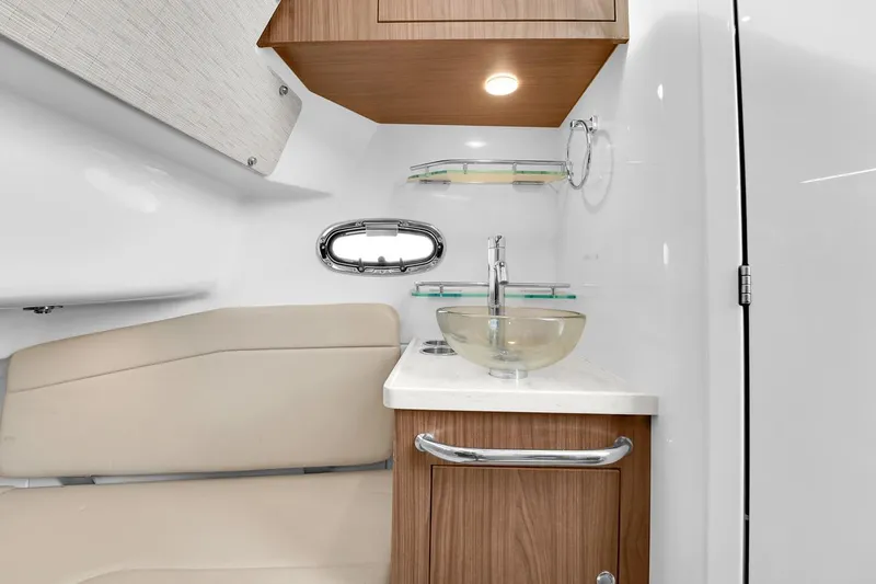 Slide: The Image of Luxurious interior of 2020 Boston Whaler 380 Outrage with modern sink and seating. - 49