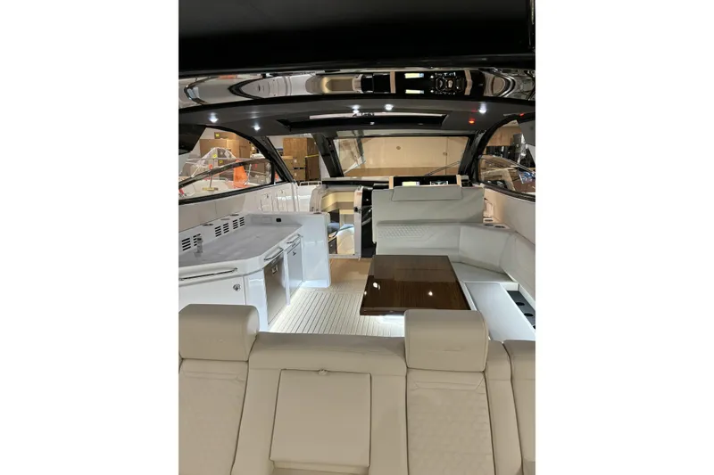 Slide: The Image of Luxurious interior of 2024 Cruisers Yachts 42 GLS OB with sleek seating and modern amenities. - 14