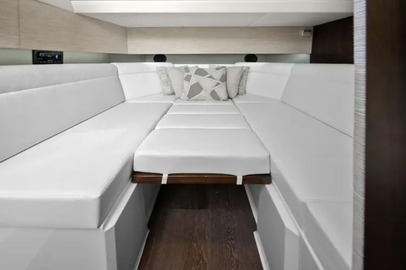 Slide: The Image of Luxurious interior cabin of 2024 Cruisers Yachts 42 GLS OB with white seating. - 23