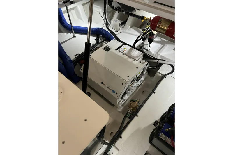 Slide: The Image of Engine compartment of 2024 Cruisers Yachts 42 GLS OB with Seakeeper 6 stabilizer. - 29