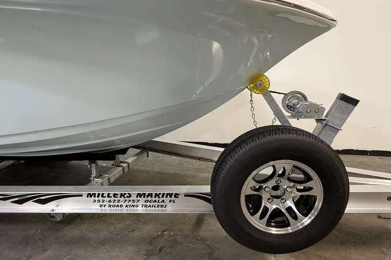 Slide: The Image of 2026 Sea Pro 202 Center Console boat on trailer, Millers Marine, Ocala, FL. - 2