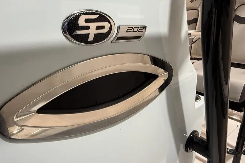 Slide: The Image of 2026 Sea Pro 202 Center Console boat interior detail with logo and seating. - 22