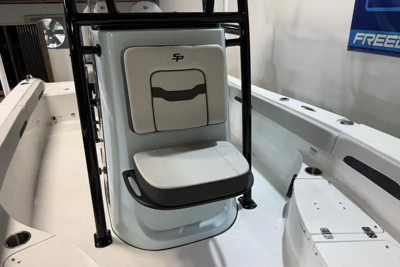 Slide: The Image of 2026 Sea Pro 202 Center Console boat interior with seating and storage. - 25