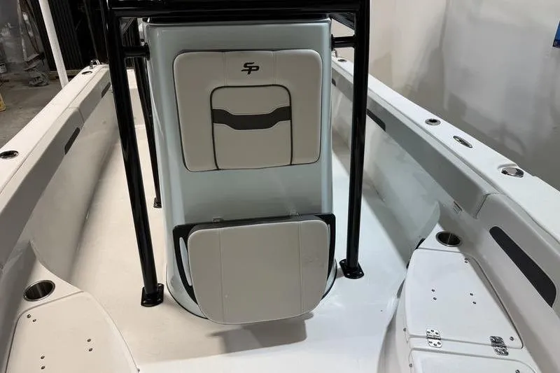 Slide: The Image of 2026 Sea Pro 202 Center Console boat interior with seating and storage compartments. - 26