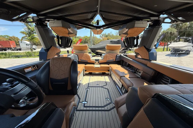 Slide: The Image of Luxurious interior of 2020 Nautique Super Air Nautique G25 Paragon boat, featuring premium seating. - 13