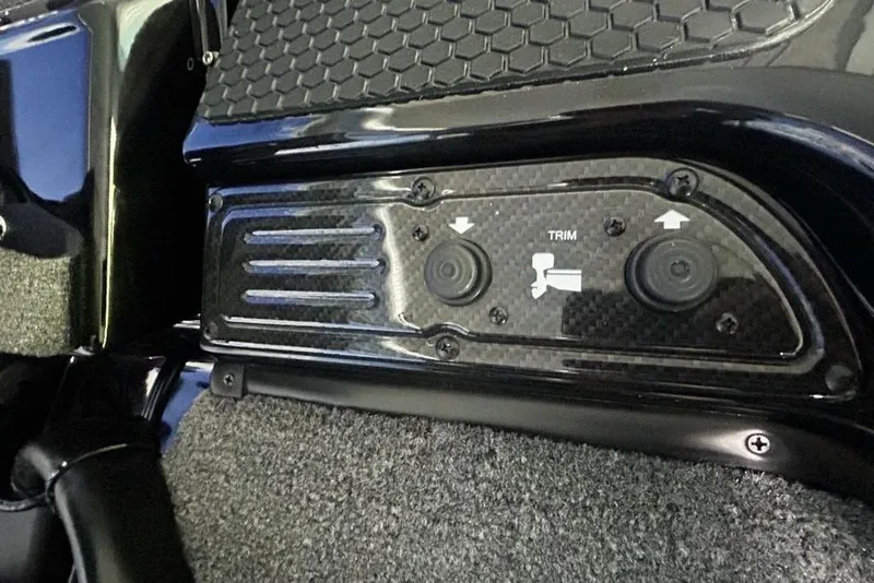 Slide: The Image of Control panel of 2026 Phoenix 819 ZXL with trim adjustment buttons. - 14