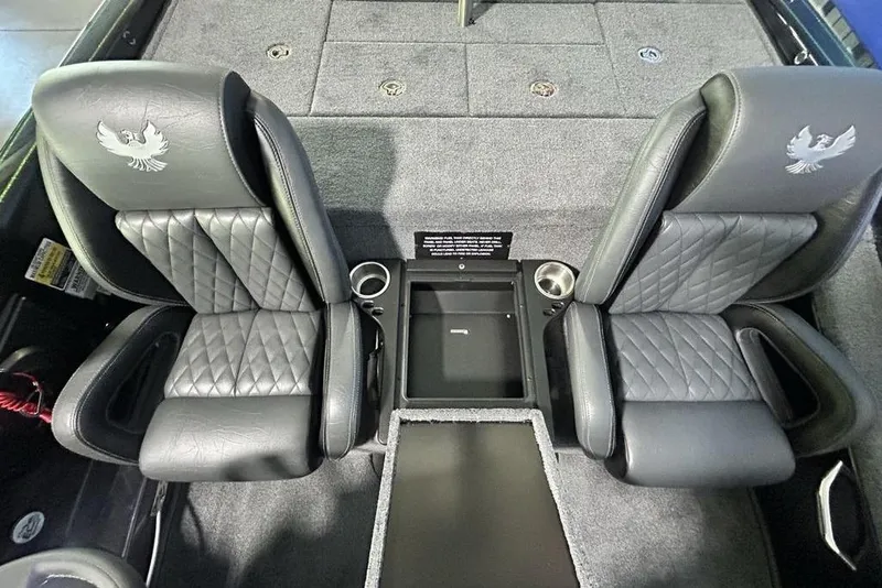 Slide: The Image of Luxury seating in 2026 Phoenix 819 ZXL boat with quilted leather and cup holders. - 17