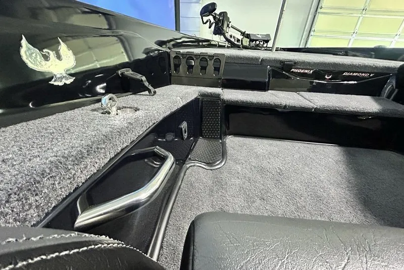 Slide: The Image of Interior of 2026 Phoenix 819 ZXL boat, featuring sleek design and modern controls. - 5