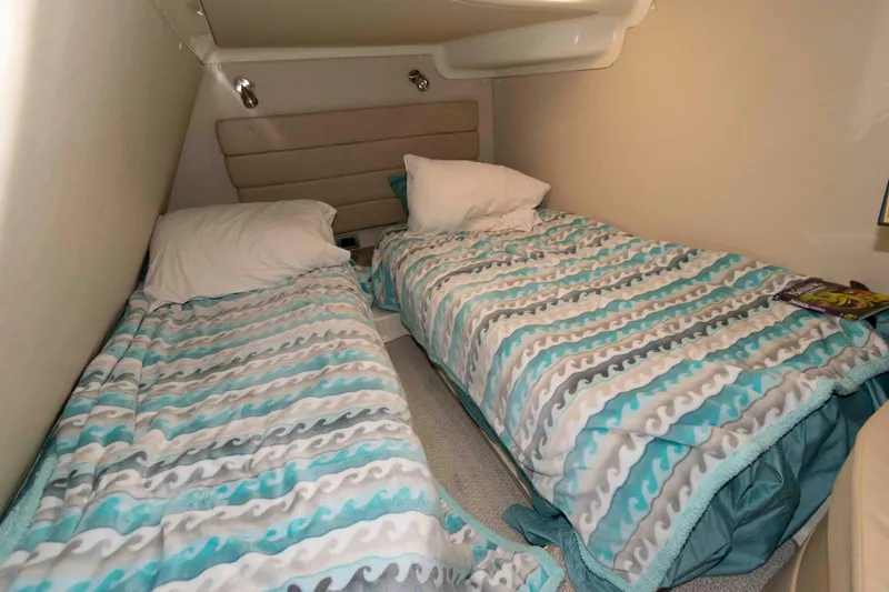 Slide: The Image of Twin beds in the cabin of a 2008 Monterey 350 Sport Yacht. - 17