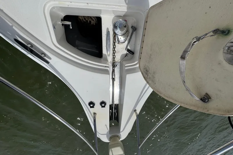 Slide: The Image of Anchor system on 2003 Silverton 39 Motor Yacht, featuring chain and winch. - 12