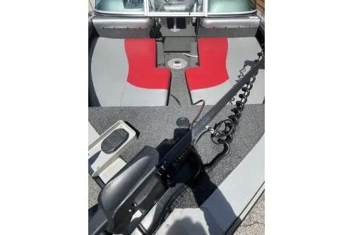 Slide: The Image of 2010 Lowe Fish & Ski 175 boat interior with red and gray seating. - 5