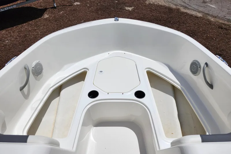 Slide: The Image of 2021 Bayliner Element E18 boat interior with seating and cup holders. - 13