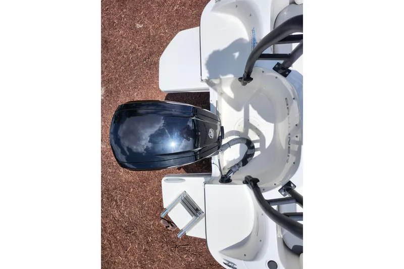 Slide: The Image of 2021 Bayliner Element E18 boat with outboard motor and swim platform, viewed from above. - 34