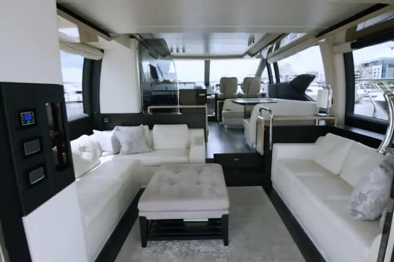 Slide: The Image of Luxurious interior of a 2017 Azimut 66 yacht with elegant seating and modern design. - 6