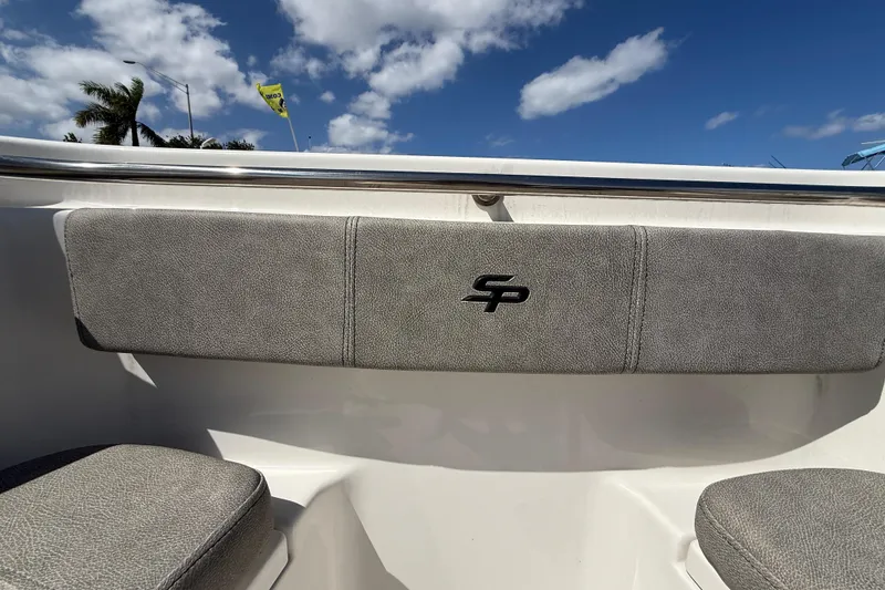 Slide: The Image of 2023 Sea Pro 219 Center Console boat interior with gray cushioned seating. - 21