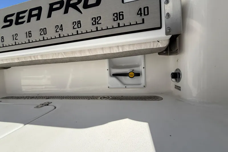 Slide: The Image of 2023 Sea Pro 219 Center Console boat with measuring scale and control panel. - 22