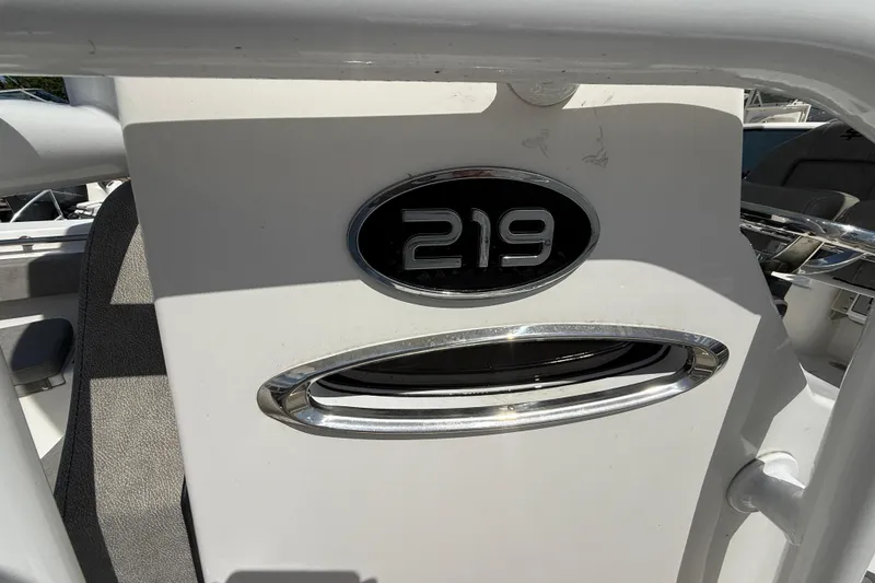 Slide: The Image of 2023 Sea Pro 219 Center Console boat interior with model emblem. - 24