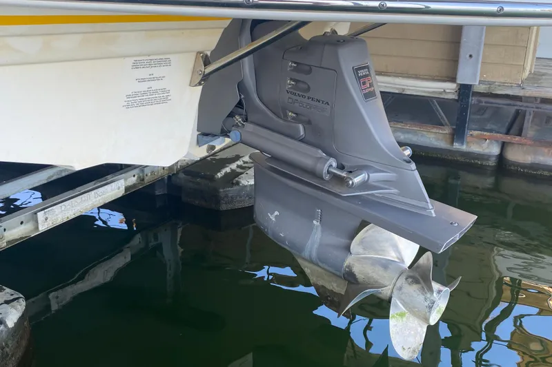 Slide: The Image of 2003 Chaparral Sunesta 263 boat with Volvo Penta outdrive in water. - 10