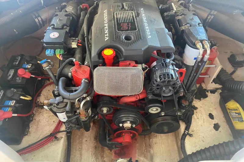 Slide: The Image of Volvo Penta engine in 2003 Chaparral Sunesta 263 boat, showing detailed components. - 21