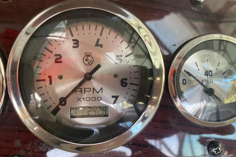 Slide: The Image of Close-up of 2003 Chaparral Sunesta 263 RPM and oil pressure gauges. - 27