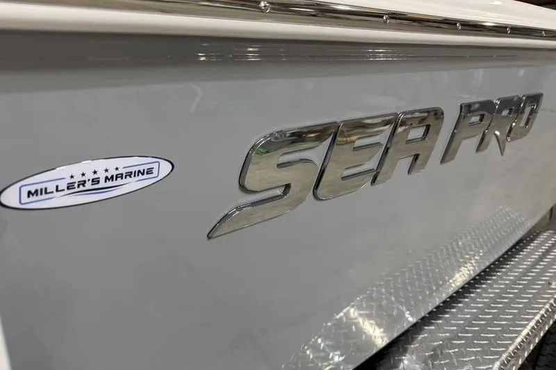 Slide: The Image of 2026 Sea Pro 210 Bay boat with Miller's Marine logo on the side. - 4