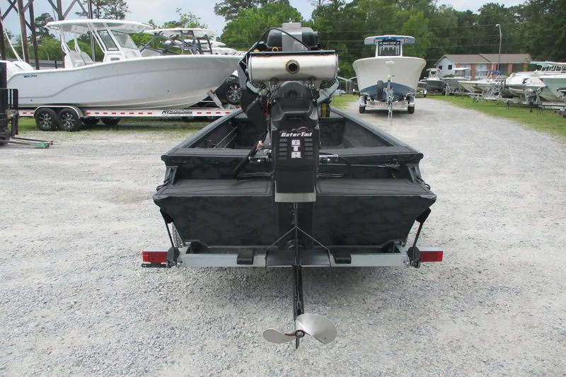 Slide: The Image of 2026 Gator Tail 1860 Extreme CC boat on trailer, rear view in outdoor setting. - 5